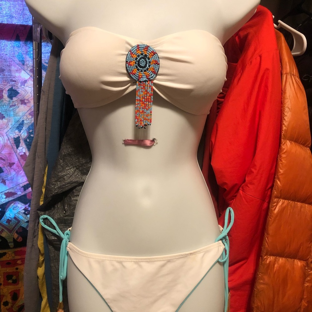Swimsuit Native American or Mexican bead design detailing.